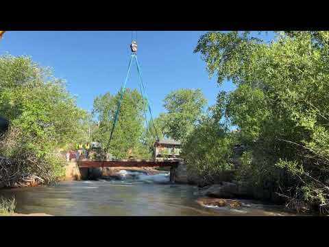 Kran crane removing a bridge span in Denver